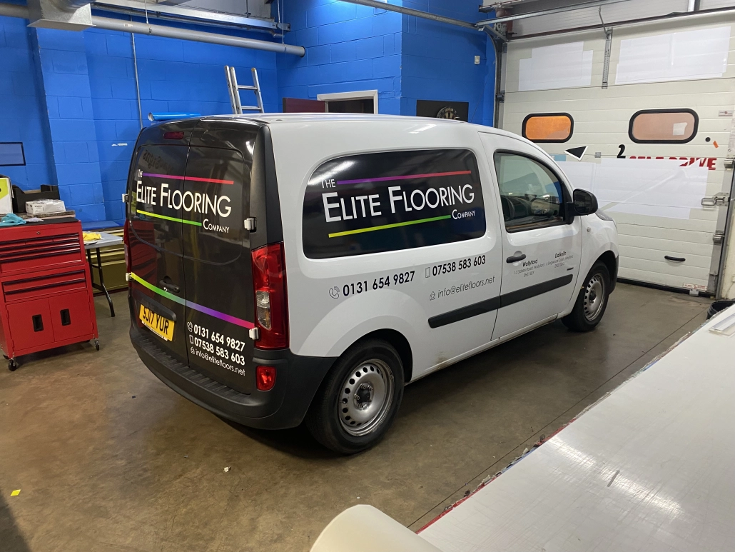 Elite Flooring van with cut vinyl lettering and contact numbers on the rear doors